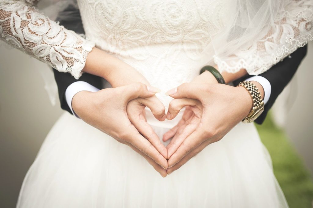 St Cloud MN Marriage Therapy Couple with Hands in the Shape of Hearts