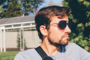 Man in Sunglasses Contemplates Men's Issues in his Life Man in Sunglasses Contemplates Men's Issues in his Life